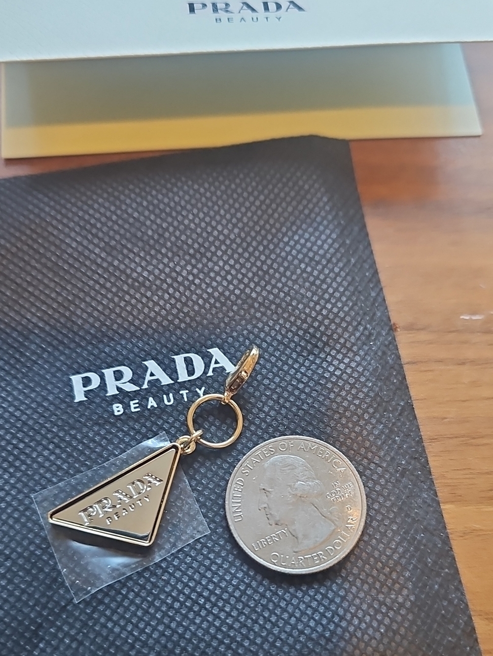 Prada Two Tone Gold/Silver Triangle Charm.